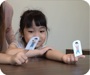 A teacher from The Learning Lab helping a student with problem solving during enrichment class