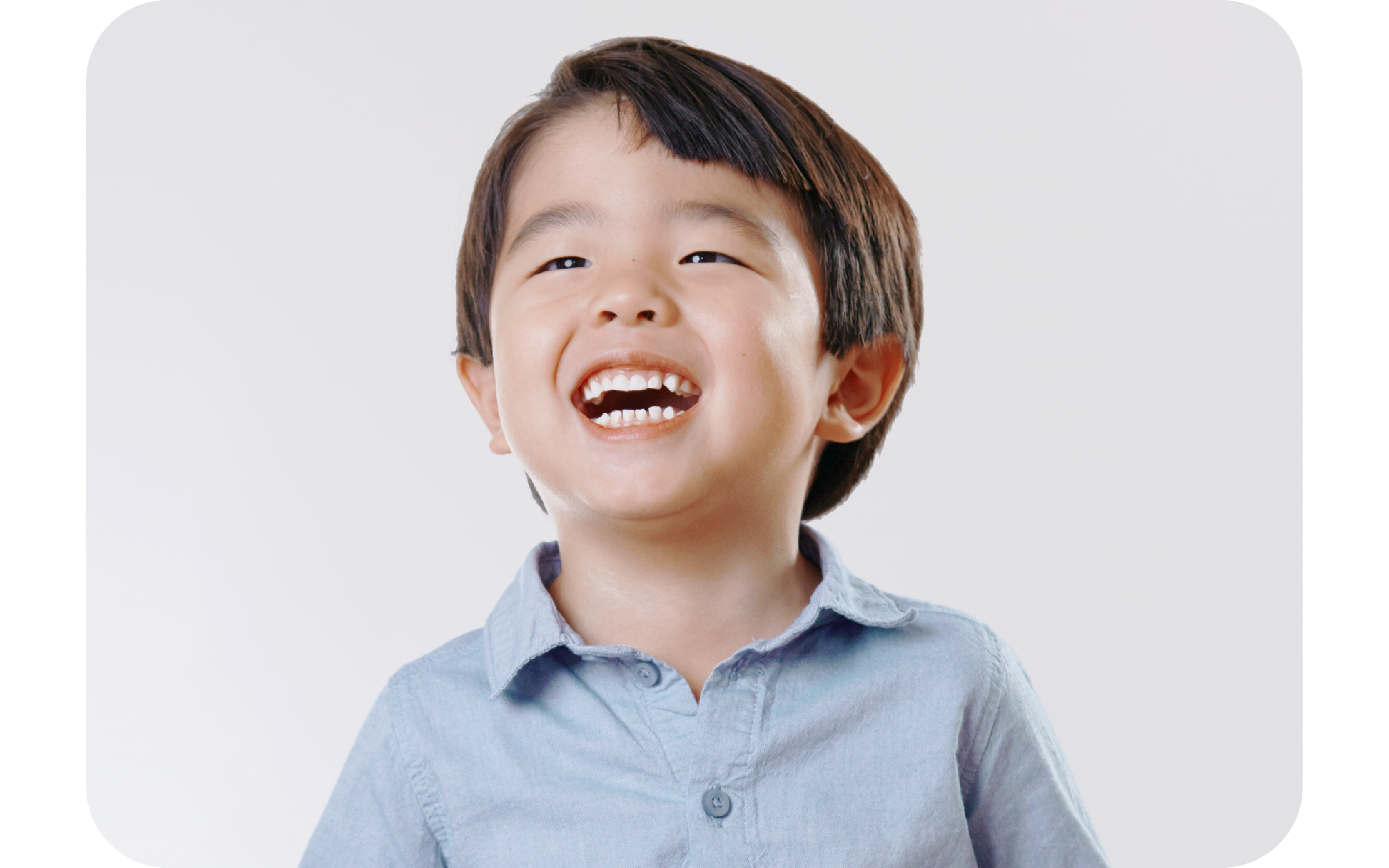 2 primary 2 (P2) students cooperating on a tuition assignment during class at The Learning Lab